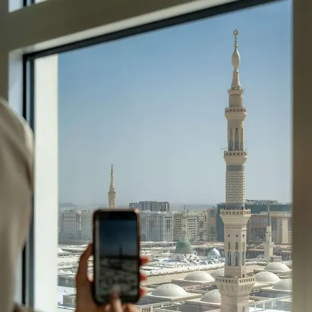 Anwar Al Madinah Moevenpick Hotel Medina Exterior photo A view of the tower from a hotel room